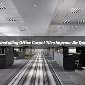 A photo of a textured, gray office carpet tile with a waffle pattern. With a white text overlay "Does Installing Office Carpet Tiles Improve Air Quality?"