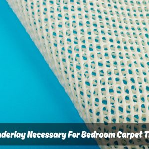 White rolled underlay for carpet tiles on a blue background