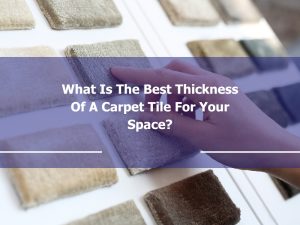 Hand selecting a carpet tile sample while considering the best thickness of carpet tile for your space.