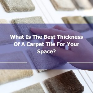Hand selecting a carpet tile sample while considering the best thickness of carpet tile for your space.